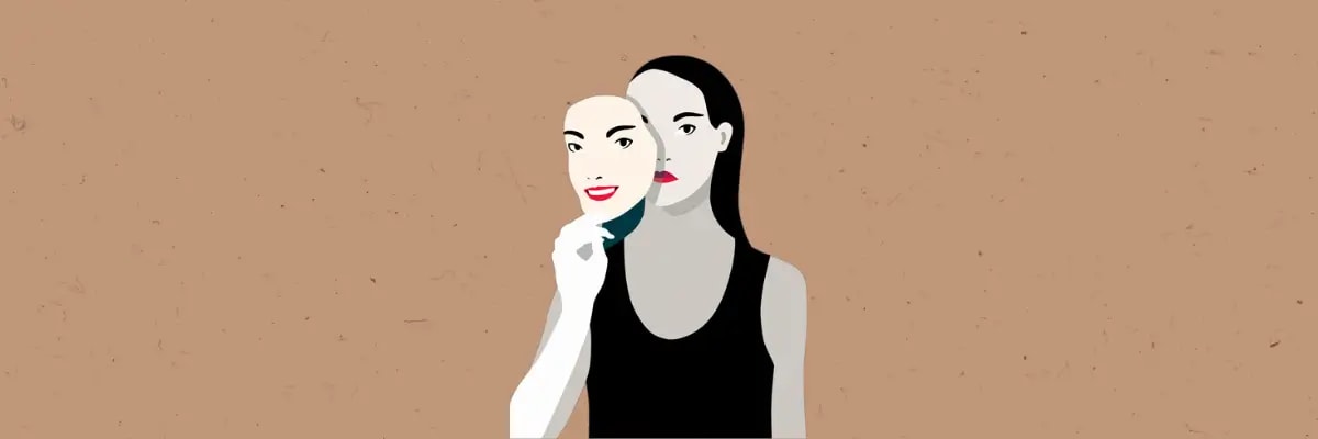 A woman wearing red lipstick holds a mask slightly away from her face, where the masked face is smiling but the woman behind it is not.