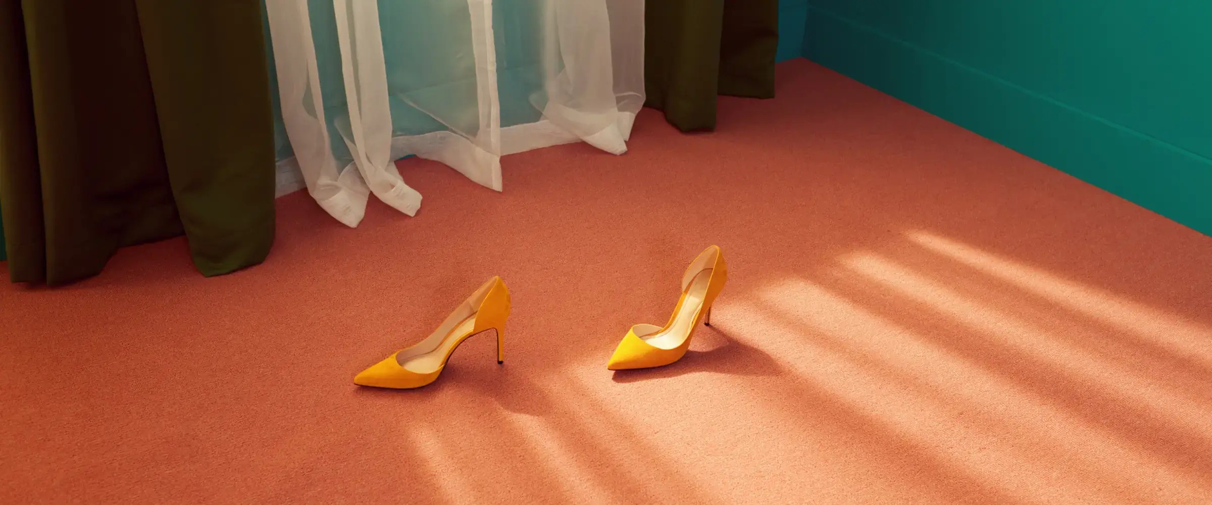 A pair of yellow stiletto high heels sit abandoned on the floor.