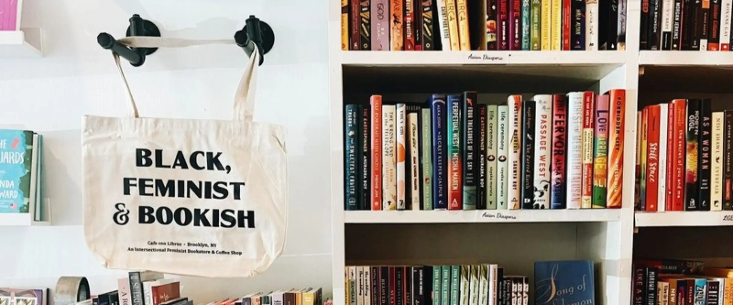 Bookshelves inside the Cafe con Libros bookstore in Brooklyn.